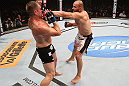 RIO DE JANEIRO, BRAZIL - OCTOBER 13:  (R-L) Glover Teixeira punches Fabio Maldonado during their light heavyweight fight at UFC 153 inside HSBC Arena on October 13, 2012 in Rio de Janeiro, Brazil.  (Photo by Josh Hedges/Zuffa LLC/Zuffa LLC via Getty Images)