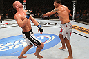 RIO DE JANEIRO, BRAZIL - OCTOBER 13:  (R-L) Antonio Rodrigo "Minotauro" Nogeuira knocks down Dave Herman with a punch during their heavyweight fight at UFC 153 inside HSBC Arena on October 13, 2012 in Rio de Janeiro, Brazil.  (Photo by Josh Hedges/Zuffa LLC/Zuffa LLC via Getty Images)