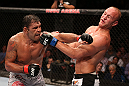 RIO DE JANEIRO, BRAZIL - OCTOBER 13:  (L-R) Antonio Rodrigo "Minotauro" Nogeuira puncehs Dave Herman during their heavyweight fight at UFC 153 inside HSBC Arena on October 13, 2012 in Rio de Janeiro, Brazil.  (Photo by Josh Hedges/Zuffa LLC/Zuffa LLC via Getty Images)