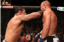 RIO DE JANEIRO, BRAZIL - OCTOBER 13:  (L-R) Antonio Rodrigo "Minotauro" Nogeuira puncehs Dave Herman during their heavyweight fight at UFC 153 inside HSBC Arena on October 13, 2012 in Rio de Janeiro, Brazil.  (Photo by Josh Hedges/Zuffa LLC/Zuffa LLC via Getty Images)