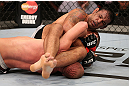 RIO DE JANEIRO, BRAZIL - OCTOBER 13:  (R-L) Antonio Rodrigo "Minotauro" Nogeuira secures an arm bar submission against during their heavyweight fight at UFC 153 inside HSBC Arena on October 13, 2012 in Rio de Janeiro, Brazil.  (Photo by Josh Hedges/Zuffa LLC/Zuffa LLC via Getty Images)