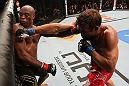 RIO DE JANEIRO, BRAZIL - OCTOBER 13:  (R-L) Stephan Bonnar punches Anderson Silva during their light heavyweight fight at UFC 153 inside HSBC Arena on October 13, 2012 in Rio de Janeiro, Brazil.  (Photo by Josh Hedges/Zuffa LLC/Zuffa LLC via Getty Images)