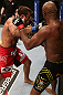RIO DE JANEIRO, BRAZIL - OCTOBER 13:  (L-R) Stephan Bonnar punches Anderson Silva during their light heavyweight fight at UFC 153 inside HSBC Arena on October 13, 2012 in Rio de Janeiro, Brazil.  (Photo by Josh Hedges/Zuffa LLC/Zuffa LLC via Getty Images)