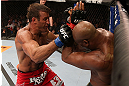 RIO DE JANEIRO, BRAZIL - OCTOBER 13:  (L-R) Stephan Bonnar punches Anderson Silva during their light heavyweight fight at UFC 153 inside HSBC Arena on October 13, 2012 in Rio de Janeiro, Brazil.  (Photo by Josh Hedges/Zuffa LLC/Zuffa LLC via Getty Images)