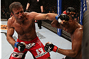 RIO DE JANEIRO, BRAZIL - OCTOBER 13:  (L-R) Stephan Bonnar punches Anderson Silva during their light heavyweight fight at UFC 153 inside HSBC Arena on October 13, 2012 in Rio de Janeiro, Brazil.  (Photo by Josh Hedges/Zuffa LLC/Zuffa LLC via Getty Images)