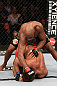 RIO DE JANEIRO, BRAZIL - OCTOBER 13:   Anderson Silva (top) punches Stephan Bonnar during their light heavyweight fight at UFC 153 inside HSBC Arena on October 13, 2012 in Rio de Janeiro, Brazil.  (Photo by Josh Hedges/Zuffa LLC/Zuffa LLC via Getty Images)