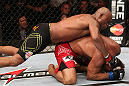 RIO DE JANEIRO, BRAZIL - OCTOBER 13:  (L-R) Anderson Silva punches Stephan Bonnar during their light heavyweight fight at UFC 153 inside HSBC Arena on October 13, 2012 in Rio de Janeiro, Brazil.  (Photo by Josh Hedges/Zuffa LLC/Zuffa LLC via Getty Images)