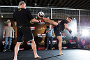 HONG KONG - NOVEMBER 07:  Cung Le works out for media and fans during a UFC open workout session at Harbour City Mall on November 7, 2012 in Hong Kong, Hong Kong.  (Photo by Josh Hedges/Zuffa LLC/Zuffa LLC via Getty Images)