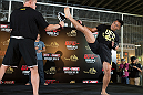 HONG KONG - NOVEMBER 07:  Cung Le works out for media and fans during a UFC open workout session at Harbour City Mall on November 7, 2012 in Hong Kong, Hong Kong.  (Photo by Josh Hedges/Zuffa LLC/Zuffa LLC via Getty Images)