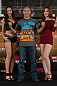 HONG KONG - NOVEMBER 07:  Tiequan Zhang (center) poses for photos with UFC Octagon Girls Jessica Cambensy (L) and Ye-Bin Kang (R) during a UFC press conference at Harbour City Mall on November 7, 2012 in Hong Kong, Hong Kong.  (Photo by Josh Hedges/Zuffa LLC/Zuffa LLC via Getty Images)
