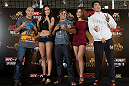 HONG KONG - NOVEMBER 07:  UFC fighters and Octagon girls pose for photos during a UFC press conference at Harbour City Mall on November 7, 2012 in Hong Kong, Hong Kong.  (Photo by Josh Hedges/Zuffa LLC/Zuffa LLC via Getty Images)