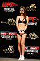 MACAU, MACAU - NOVEMBER 09:  UFC Octagon Girl Ye-Bin Kang stands on stage during the UFC Macau weigh in at Cotai Arena on November 9, 2012 in Macau, Macau.  (Photo by Josh Hedges/Zuffa LLC/Zuffa LLC via Getty Images)