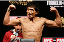 MACAU, MACAU - NOVEMBER 09:  Takeya Mizugaki makes weight during the UFC Macau weigh in at Cotai Arena on November 9, 2012 in Macau, Macau.  (Photo by Josh Hedges/Zuffa LLC/Zuffa LLC via Getty Images)