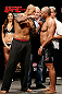 MACAU, MACAU - NOVEMBER 09:  (L-R) Opponents Thiago Silva and Stanislav Nedkov face off during the UFC Macau weigh in at Cotai Arena on November 9, 2012 in Macau, Macau.  (Photo by Josh Hedges/Zuffa LLC/Zuffa LLC via Getty Images)