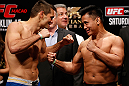 MACAU, MACAU - NOVEMBER 09:  (L-R) Opponents Rich Franklin and Cung Le face off during the UFC Macau weigh in at Cotai Arena on November 9, 2012 in Macau, Macau.  (Photo by Josh Hedges/Zuffa LLC/Zuffa LLC via Getty Images)