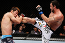MACAU, MACAU - NOVEMBER 10: (R-L) Tom DeBlass kicks Riki Fukuda during their middleweight bout at the UFC Macao event inside CotaiArena on November 10, 2012 in Macau, Macau. (Photo by Josh Hedges/Zuffa LLC/Zuffa LLC via Getty Images)
