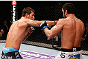 MACAU, MACAU - NOVEMBER 10:  (L-R) Riki Fukuda punches Tom DeBlass during their middleweight bout at the UFC Macao event inside CotaiArena on November 10, 2012 in Macau, Macau.  (Photo by Josh Hedges/Zuffa LLC/Zuffa LLC via Getty Images)