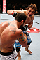 MACAU, MACAU - NOVEMBER 10: (R-L) Riki Fukuda punches Tom DeBlass during their middleweight bout at the UFC Macao event inside CotaiArena on November 10, 2012 in Macau, Macau. (Photo by Josh Hedges/Zuffa LLC/Zuffa LLC via Getty Images)