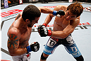 MACAU, MACAU - NOVEMBER 10: (L-R) Tom DeBlass punches Riki Fukuda during their middleweight bout at the UFC Macao event inside CotaiArena on November 10, 2012 in Macau, Macau. (Photo by Josh Hedges/Zuffa LLC/Zuffa LLC via Getty Images)