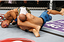 MACAU, MACAU - NOVEMBER 10: (L-R) Jon Tuck attempts an arm bar submission against Tiequan Zhang during their lightweight bout at the UFC Macao event inside CotaiArena on November 10, 2012 in Macau, Macau. (Photo by Josh Hedges/Zuffa LLC/Zuffa LLC via Getty Images)