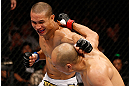 MACAU, MACAU - NOVEMBER 10: (L-R) Jon Tuck punches Tiequan Zhang during their lightweight bout at the UFC Macao event inside CotaiArena on November 10, 2012 in Macau, Macau. (Photo by Josh Hedges/Zuffa LLC/Zuffa LLC via Getty Images)