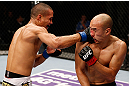 MACAU, MACAU - NOVEMBER 10: (L-R) Jon Tuck punches Tiequan Zhang during their lightweight bout at the UFC Macao event inside CotaiArena on November 10, 2012 in Macau, Macau. (Photo by Josh Hedges/Zuffa LLC/Zuffa LLC via Getty Images)