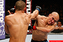 MACAU, MACAU - NOVEMBER 10: (L-R) Jon Tuck punches Tiequan Zhang during their lightweight bout at the UFC Macao event inside CotaiArena on November 10, 2012 in Macau, Macau. (Photo by Josh Hedges/Zuffa LLC/Zuffa LLC via Getty Images)