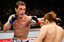 MACAU, MACAU - NOVEMBER 10: (L-R) Mac Danzig punches Takanori Gomi during their lightweight bout at the UFC Macao event inside CotaiArena on November 10, 2012 in Macau, Macau. (Photo by Josh Hedges/Zuffa LLC/Zuffa LLC via Getty Images)