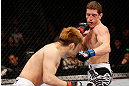 MACAU, MACAU - NOVEMBER 10: (L-R) Takanori Gomi punches Mac Danzig during their lightweight bout at the UFC Macao event inside CotaiArena on November 10, 2012 in Macau, Macau. (Photo by Josh Hedges/Zuffa LLC/Zuffa LLC via Getty Images)