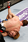 MACAU, MACAU - NOVEMBER 10: (R-L) Mac Danzig attempts a guillotine choke against Takanori Gomi during their lightweight bout at the UFC Macao event inside CotaiArena on November 10, 2012 in Macau, Macau. (Photo by Josh Hedges/Zuffa LLC/Zuffa LLC via Getty Images)
