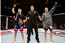 MACAU, MACAU - NOVEMBER 10: Takanori Gomi (L) and Mac Danzig (R) react as the judges' scores are read after their lightweight bout at the UFC Macao event inside CotaiArena on November 10, 2012 in Macau, Macau. (Photo by Josh Hedges/Zuffa LLC/Zuffa LLC via Getty Images)