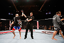 MACAU, MACAU - NOVEMBER 10: Takanori Gomi (L) reacts after defeating Mac Danzig during their lightweight bout at the UFC Macao event inside CotaiArena on November 10, 2012 in Macau, Macau. (Photo by Josh Hedges/Zuffa LLC/Zuffa LLC via Getty Images)
