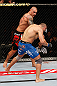 MACAU, MACAU - NOVEMBER 10: (L-R) Thiago Silva punches Stanislav Nedkov during their light heavyweight bout at the UFC Macao event inside CotaiArena on November 10, 2012 in Macau, Macau. (Photo by Josh Hedges/Zuffa LLC/Zuffa LLC via Getty Images)