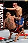 MACAU, MACAU - NOVEMBER 10: (R-L) Stanislav Nedkov knocks down Thiago Silva with a punch during their light heavyweight bout at the UFC Macao event inside CotaiArena on November 10, 2012 in Macau, Macau. (Photo by Josh Hedges/Zuffa LLC/Zuffa LLC via Getty Images)