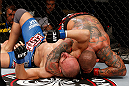 MACAU, MACAU - NOVEMBER 10: (R-L) Thiago Silva secures an arm triangle choke submission against Stanislav Nedkov during their light heavyweight bout at the UFC Macao event inside CotaiArena on November 10, 2012 in Macau, Macau. (Photo by Josh Hedges/Zuffa LLC/Zuffa LLC via Getty Images)