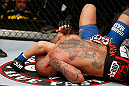 MACAU, MACAU - NOVEMBER 10: (R-L) Thiago Silva secures an arm triangle choke submission against Stanislav Nedkov during their light heavyweight bout at the UFC Macao event inside CotaiArena on November 10, 2012 in Macau, Macau. (Photo by Josh Hedges/Zuffa LLC/Zuffa LLC via Getty Images)