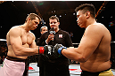 MACAU, MACAU - NOVEMBER 10: Opponents Rich Franklin (L) and Cung Le (R) touch gloves before their middleweight bout at the UFC Macao event inside CotaiArena on November 10, 2012 in Macau, Macau. (Photo by Josh Hedges/Zuffa LLC/Zuffa LLC via Getty Images)
