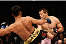 MACAU, MACAU - NOVEMBER 10: (L-R) Cung Le kicks Rich Franklin during their middleweight bout at the UFC Macao event inside CotaiArena on November 10, 2012 in Macau, Macau. (Photo by Josh Hedges/Zuffa LLC/Zuffa LLC via Getty Images)