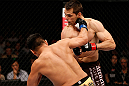 MACAU, MACAU - NOVEMBER 10: (L-R) Cung Le knocks out Rich Franklin with a punch during their middleweight bout at the UFC Macao event inside CotaiArena on November 10, 2012 in Macau, Macau. (Photo by Josh Hedges/Zuffa LLC/Zuffa LLC via Getty Images)