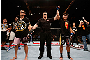 MACAU, MACAU - NOVEMBER 10: Cung Le (R) reacts after knocking out Rich Franklin during their middleweight bout at the UFC Macao event inside CotaiArena on November 10, 2012 in Macau, Macau. (Photo by Josh Hedges/Zuffa LLC/Zuffa LLC via Getty Images)