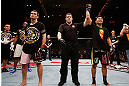 MACAU, MACAU - NOVEMBER 10: Cung Le (R) reacts after knocking out Rich Franklin during their middleweight bout at the UFC Macao event inside CotaiArena on November 10, 2012 in Macau, Macau. (Photo by Josh Hedges/Zuffa LLC/Zuffa LLC via Getty Images)