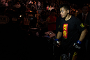 MACAU, MACAU - NOVEMBER 10:  Cung Le exits the arena after knocking out Rich Franklin during their middleweight bout at the UFC Macao event inside CotaiArena on November 10, 2012 in Macau, Macau.  (Photo by Josh Hedges/Zuffa LLC/Zuffa LLC via Getty Images)