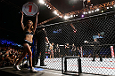 MACAU, MACAU - NOVEMBER 10: UFC Octagon Girl Jessica Cambensy introduces a round at the UFC Macao event inside CotaiArena on November 10, 2012 in Macau, Macau. (Photo by Josh Hedges/Zuffa LLC/Zuffa LLC via Getty Images)