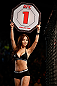 MACAU, MACAU - NOVEMBER 10: UFC Octagon Girl Ye-Bin Kang introduces a round at the UFC Macao event inside CotaiArena on November 10, 2012 in Macau, Macau. (Photo by Josh Hedges/Zuffa LLC/Zuffa LLC via Getty Images)