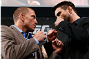 MONTREAL, CANADA - NOVEMBER 14:  (L-R) Opponents Georges St-Pierre and Carlos Condit face off during the final pre-fight press conference ahead of UFC 154 at New City Gas on November 14, 2012 in Montreal, Quebec, Canada.  (Photo by Josh Hedges/Zuffa LLC/Zuffa LLC via Getty Images)