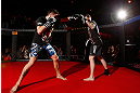 MONTREAL, CANADA - NOVEMBER 15:  Carlos Condit works out for media and fans during an open training session ahead of UFC 154 at New City Gas on November 15, 2012 in Montreal, Quebec, Canada.  (Photo by Josh Hedges/Zuffa LLC/Zuffa LLC via Getty Images)