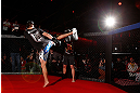 MONTREAL, CANADA - NOVEMBER 15:  Carlos Condit works out for media and fans during an open training session ahead of UFC 154 at New City Gas on November 15, 2012 in Montreal, Quebec, Canada.  (Photo by Josh Hedges/Zuffa LLC/Zuffa LLC via Getty Images)