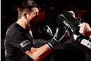 MONTREAL, CANADA - NOVEMBER 15:  Carlos Condit works out for media and fans during an open training session ahead of UFC 154 at New City Gas on November 15, 2012 in Montreal, Quebec, Canada.  (Photo by Josh Hedges/Zuffa LLC/Zuffa LLC via Getty Images)