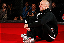 MONTREAL, CANADA - NOVEMBER 15:  Georges St-Pierre sits in the Octagon during an open training session ahead of UFC 154 at New City Gas on November 15, 2012 in Montreal, Quebec, Canada.  (Photo by Josh Hedges/Zuffa LLC/Zuffa LLC via Getty Images)