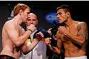 MONTREAL, CANADA - NOVEMBER 16:  (L-R) Opponents Mark Bocek and Rafael dos Anjos face off during the official UFC 154 weigh in at New City Gas on November 16, 2012 in Montreal, Quebec, Canada.  (Photo by Josh Hedges/Zuffa LLC/Zuffa LLC via Getty Images)